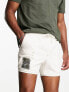 ASOS DESIGN slim shorter length denim cargo shorts with patch in ecru