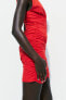 Fitted mini dress with draped detail