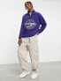 ASOS DESIGN oversized polar fleece half zip sweatshirt in navy with city embroidery