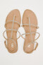 Flat slider sandals with rhinestone straps