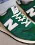 New Balance 574 trainers in dark green