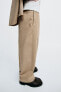 True neutrals carrot fit trousers with darts