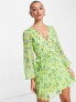 Фото #1 товара ASOS DESIGN button through ruched waist pleated mini dress in green floral print