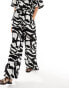 ASOS DESIGN cheesecloth tie waist wide pull on trouser in print