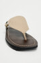 Leather flat sandals with rings