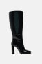 Faux patent finish high-heel boots