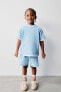 Plush t-shirt and waffle-knit bermuda shorts co-ord