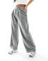 Фото #4 товара Miss Selfridge Petite slouchy wide leg pinstripe trousers with extended tab detail in light grey