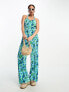 Monki jersey plisse cross back detail jumpsuit in blue and green flower print