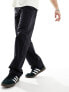 Weekday Frej relaxed fit workwear trousers with pocket detail in black