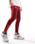 Фото #2 товара adidas Football Manchester United tracksuit joggers in burgundy