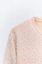 Beaded knit top