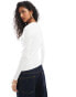 Фото #3 товара Levi's small batwing logo vneck long sleeve t-shirt in white