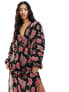 ASOS DESIGN long sleeve batwing plisse midi dress with tie back in black base red rose print