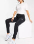 Фото #2 товара New Balance unisex leggings in black