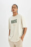 Фото #3 товара DeFactoFit NBA Milwaukee Bucks Oversize Fit Bisiklet Yaka Kısa Kollu Tişört C4458AX24HS