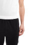 ASOS 4505 training mesh shorts with contrast hem in black and white