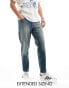 Фото #2 товара ASOS DESIGN tapered fit jeans with panelling in a vintage tint dark blue - TURQUOISE