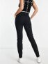 Vero Moda Tall paperbag tie waist tapered trousers in black