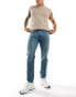 DTT rigid slim fit jeans in mid blue vintage tint