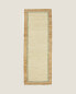 Rectangular jute rug with contrast border