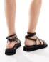 Truffle Collection wide fit ankle strap sandal in black