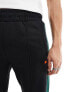 Фото #14 товара ellesse Luxor straight leg track pants in black