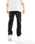 Sean John script logo wide leg cargo trousers in black with front hem split