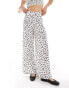 Wednesday's Girl polka dot wide leg trousers in white