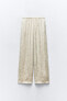 Creased-effect palazzo trousers