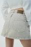 Low-rise denim mini skirt