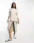 Vero Moda Tall high neck knitted jumper in cream