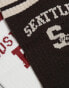 ASOS DESIGN 2 pack sports socks with Boston and Seattle graphics in ecru and brown