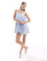 ASOS DESIGN mini textured scoop neck dress with big back bow detail in icy blue