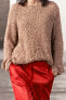 Knit sweater with woven trim