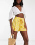 Фото #1 товара ASOS DESIGN tie belt flippy short in mustard ditsy floral