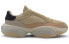 Фото #3 товара Кроссовки PUMA ALTERATION Premium Leather 371597-02 в стиле спортивный текстильные для мужчин и женщин, цвета коричневый и розовый.