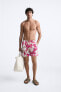 LONG FLORAL PRINT SWIMMING TRUNKS