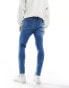 ASOS DESIGN spray on jeans with power stretch in tinted wash blue