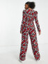 Monki jumpsuit with long sleeves in red all over print