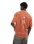 ASOS DESIGN oversized t-shirt in orange with celestial back print