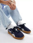 Reebok Club C Grounds trainers in navy with gum sole