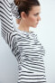 Delicate striped asymmetric top with overlay detail