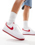 Nike Air Force 1 trainers in white and red