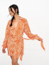 Фото #2 товара ASOS DESIGN plisse wrap collared mini dress in orange zebra print