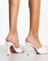 ASOS DESIGN Nayden twisted high heeled mules in white