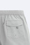 Check-texture swimming trunks