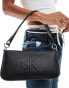 Фото #1 товара Calvin Klein Jeans sculpted shoulder pouch in black