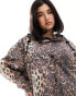 ASOS DESIGN Curve long raincoat in animal print