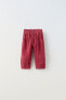 Фото #1 товара Вельветовые брюки со сборкой на поясе ZARA